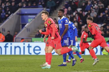Solly March #7 of Brighton & Hove Albion celebrates Evan Ferguson #28 of Brighton & Hove Albions goal to make it 2-2 during the Premier League match Leicester City vs Brighton and Hove Albion at King Power Stadium, Leicester, United Kingdom