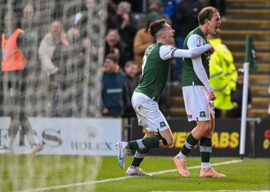 GOAL Plymouth Argyle midfielder Callum Wright (26)  celebrates a goal with Plymouth Argyle forward Ryan Hardie  (9) to make it 3-1  during the Sky Bet League 1 match Plymouth Argyle vs Cheltenham Town at Home Park, Plymouth, United Kingdom, 21st Janu