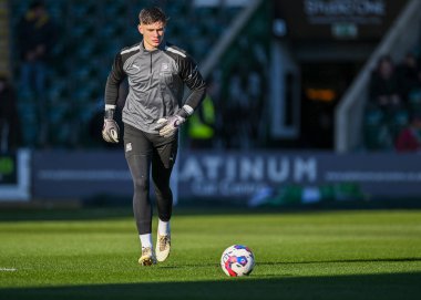 Plymouth Argyle goalkeeper Michael Cooper  (1) warming up  during the Sky Bet League 1 match Plymouth Argyle vs Cheltenham Town at Home Park, Plymouth, United Kingdom, 21st January 202