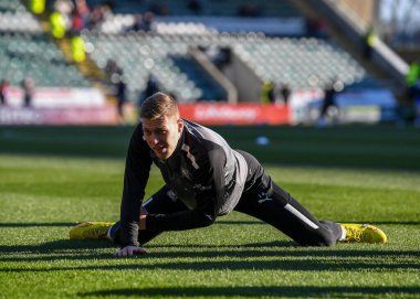 Plymouth Argyle midfielder Sam Cosgrove (16) warming up  during the Sky Bet League 1 match Plymouth Argyle vs Cheltenham Town at Home Park, Plymouth, United Kingdom, 21st January 202