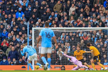 Erling Hland #9 of Manchester City scores a goal to make it 3-0 during the Premier League match Manchester City vs Wolverhampton Wanderers at Etihad Stadium, Manchester, United Kingdom, 22nd January 2023