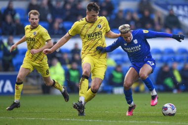 Callum Robinson #47 of Cardiff City under pressure from Jake Cooper #5 of Millwall during the Sky Bet Championship match Cardiff City vs Millwall at Cardiff City Stadium, Cardiff, United Kingdom, 21st January 202