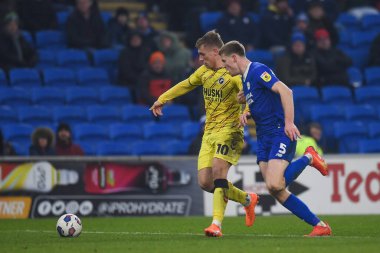 Zian Flemming #10 of Millwall under pressure from Mark McGuinness #5 of Cardiff City  during the Sky Bet Championship match Cardiff City vs Millwall at Cardiff City Stadium, Cardiff, United Kingdom, 21st January 202