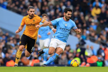 Ilkay Gundogan #8 of Manchester City runs from Ruben Neves #8 of Wolverhampton Wanderers during the Premier League match Manchester City vs Wolverhampton Wanderers at Etihad Stadium, Manchester, United Kingdom, 22nd January 202