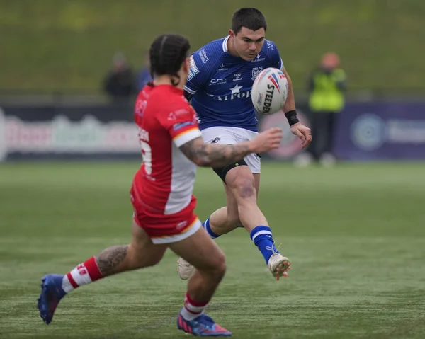 Jake Clifford #7 of Hull FC kicks through during the Rugby League Pre Season match Sheffield Eagles vs Hull FC at Sheffield Olympic Legacy Park, Sheffield, United Kingdom, 22nd January 202