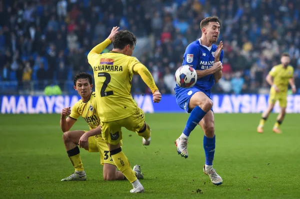 Dan McNamara #2 of Millwall clears his defence under pressure from Ryan Wintle #6 of Cardiff City  during the Sky Bet Championship match Cardiff City vs Millwall at Cardiff City Stadium, Cardiff, United Kingdom, 21st January 202