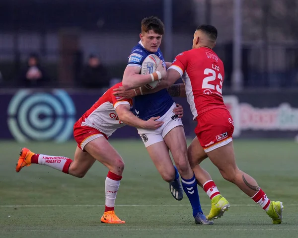Davy Litten #25 of Hull FC is tackled during the Rugby League Pre Season match Sheffield Eagles vs Hull FC at Sheffield Olympic Legacy Park, Sheffield, United Kingdom, 22nd January 202
