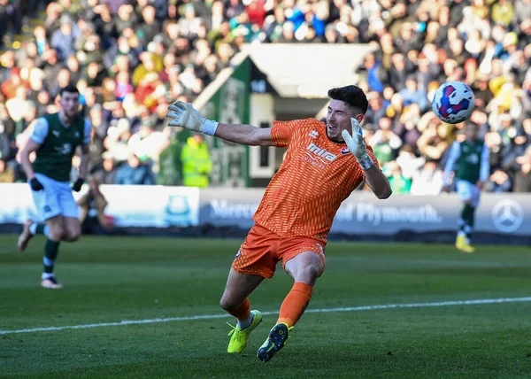 GOAL Cheltenham Town goalkeeper Luke Southwood  (1) cant stop the ball hitting back of the net from Plymouth Argyle defender Dan Scarr  (6) shot during the Sky Bet League 1 match Plymouth Argyle vs Cheltenham Town at Home Park, Plymouth, UK