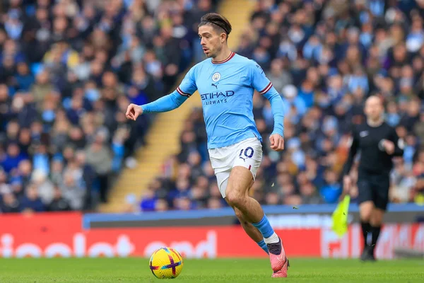 Jack Grealish #10 of Manchester City runs with the ball during the Premier League match Manchester City vs Wolverhampton Wanderers at Etihad Stadium, Manchester, United Kingdom, 22nd January 202