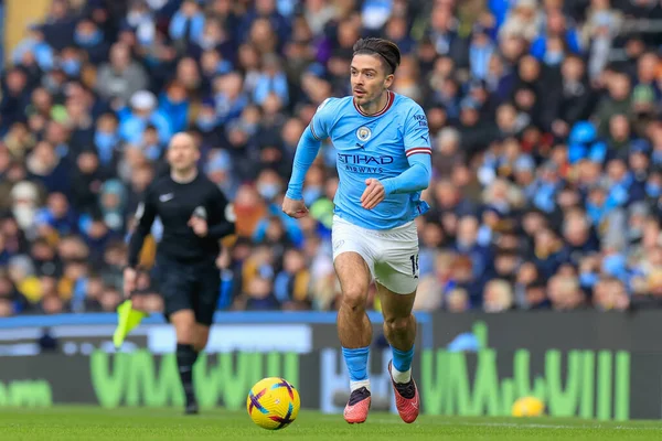 Jack Grealish #10 of Manchester City runs with the ball during the Premier League match Manchester City vs Wolverhampton Wanderers at Etihad Stadium, Manchester, United Kingdom, 22nd January 202