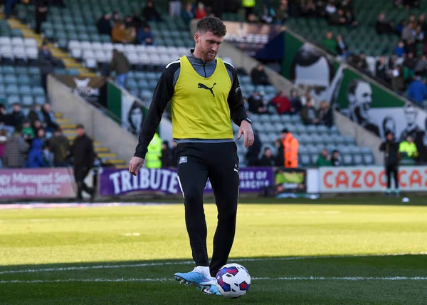 Plymouth Argyle defender Dan Scarr  (6) warming up  during the Sky Bet League 1 match Plymouth Argyle vs Cheltenham Town at Home Park, Plymouth, United Kingdom, 21st January 202