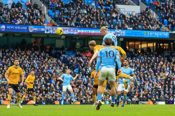 Erling Hland #9 of Manchester City scores a goal to make it 1-0 during the Premier League match Manchester City vs Wolverhampton Wanderers at Etihad Stadium, Manchester, United Kingdom, 22nd January 2023
