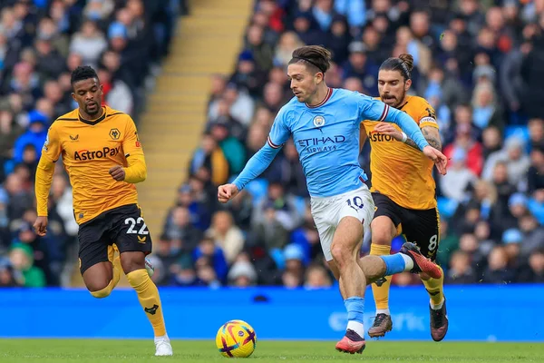 Jack Grealish #10 of Manchester City runs with the ball during the Premier League match Manchester City vs Wolverhampton Wanderers at Etihad Stadium, Manchester, United Kingdom, 22nd January 202