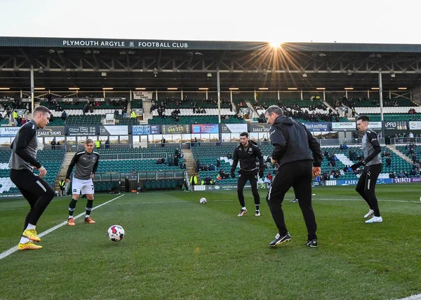 Plymouth Argyle warming up including Plymouth Argyle First team coach Kevin Nancekivell  during the Sky Bet League 1 match Plymouth Argyle vs Cheltenham Town at Home Park, Plymouth, United Kingdom, 21st January 202