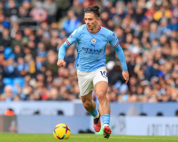 Jack Grealish #10 of Manchester City runs with the ball during the Premier League match Manchester City vs Wolverhampton Wanderers at Etihad Stadium, Manchester, United Kingdom, 22nd January 202