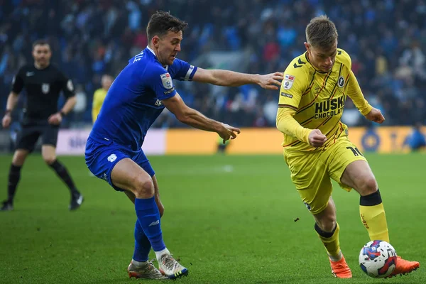 Zian Flemming #10 of Millwall under pressure from Ryan Wintle #6 of Cardiff City  during the Sky Bet Championship match Cardiff City vs Millwall at Cardiff City Stadium, Cardiff, United Kingdom, 21st January 202