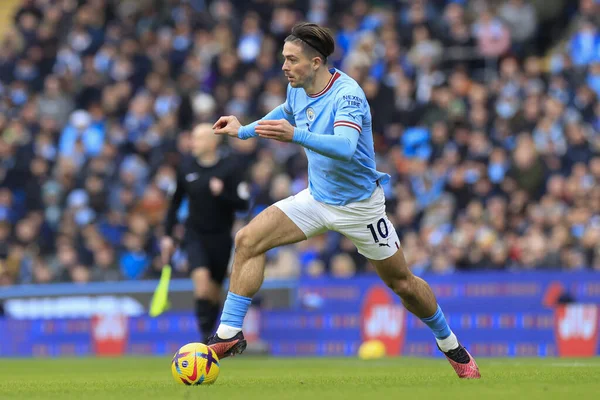 Jack Grealish #10 of Manchester City  runs with the ball during the Premier League match Manchester City vs Wolverhampton Wanderers at Etihad Stadium, Manchester, United Kingdom, 22nd January 202