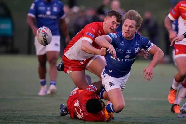 Brad Dwyer #33 of Hull FC offloads the ball during the Rugby League Pre Season match Sheffield Eagles vs Hull FC at Sheffield Olympic Legacy Park, Sheffield, United Kingdom, 22nd January 202