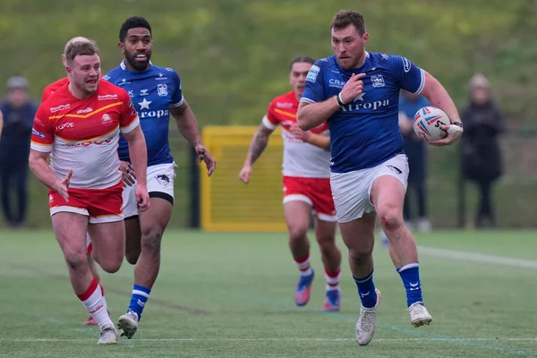 Scott Taylor #30 of Hull FC makes a break during the Rugby League Pre Season match Sheffield Eagles vs Hull FC at Sheffield Olympic Legacy Park, Sheffield, United Kingdom, 22nd January 202