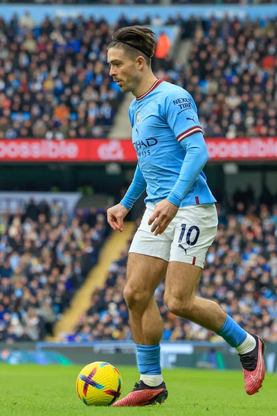 Jack Grealish #10 of Manchester City runs with the ball during the Premier League match Manchester City vs Wolverhampton Wanderers at Etihad Stadium, Manchester, United Kingdom, 22nd January 202