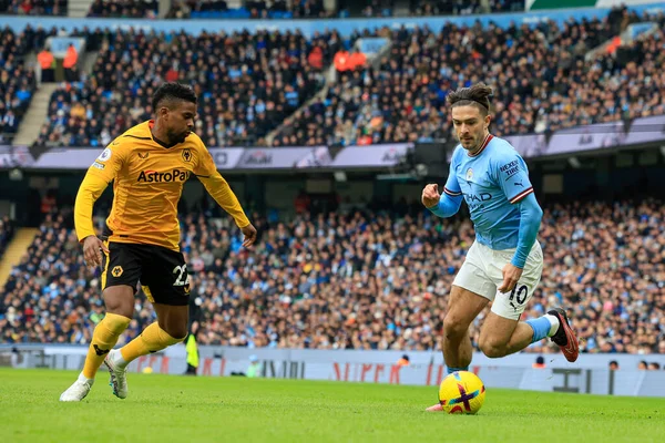 Jack Grealish #10 of Manchester City turns past Nelson Semedo #22 of Wolverhampton Wanderers during the Premier League match Manchester City vs Wolverhampton Wanderers at Etihad Stadium, Manchester, United Kingdom, 22nd January 202