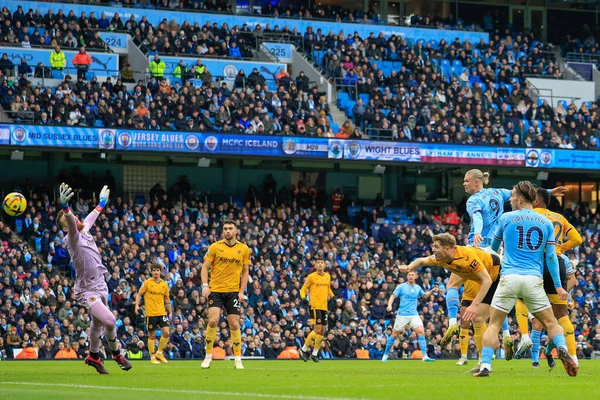 Erling Hland #9 of Manchester City scores a goal to make it 1-0 during the Premier League match Manchester City vs Wolverhampton Wanderers at Etihad Stadium, Manchester, United Kingdom, 22nd January 2023
