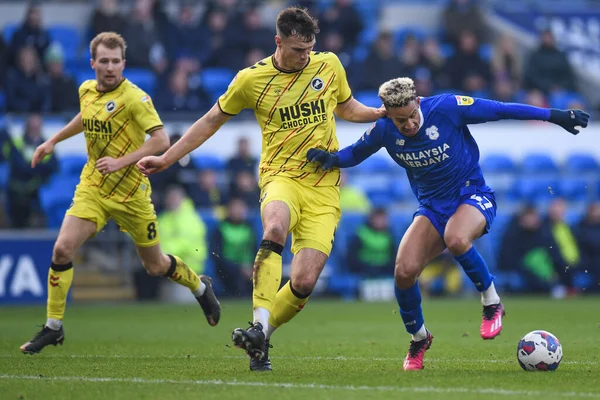Callum Robinson #47 of Cardiff City under pressure from Jake Cooper #5 of Millwall during the Sky Bet Championship match Cardiff City vs Millwall at Cardiff City Stadium, Cardiff, United Kingdom, 21st January 202