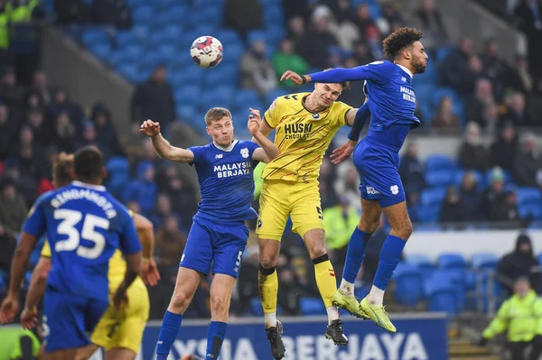 Mark McGuinness #5 of Cardiff City  and Jake Cooper #5 of Millwall challenge the high ballduring the Sky Bet Championship match Cardiff City vs Millwall at Cardiff City Stadium, Cardiff, United Kingdom, 21st January 202