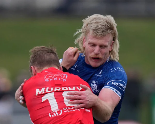 Brad Fash #13 of Hull FC tackles Aaron Murphy #18 of Sheffield Eagles during the Rugby League Pre Season match Sheffield Eagles vs Hull FC at Sheffield Olympic Legacy Park, Sheffield, United Kingdom, 22nd January 202