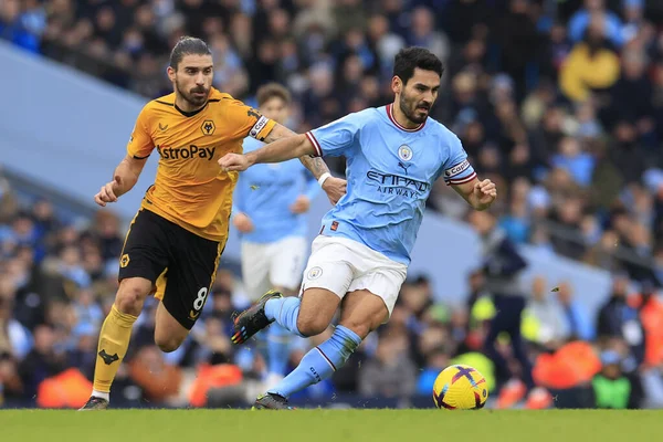 Ilkay Gundogan #8 of Manchester City runs from Ruben Neves #8 of Wolverhampton Wanderers during the Premier League match Manchester City vs Wolverhampton Wanderers at Etihad Stadium, Manchester, United Kingdom, 22nd January 202