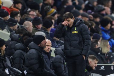 Antonio Conte manager of Totitehanm Hotspur wipes his eye during the Premier League match Fulham vs Tottenham Hotspur at Craven Cottage, London, United Kingdom, 23rd January 202