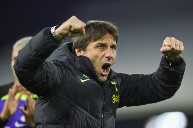 Antonio Conte manager of Totitehanm Hotspur celebrates his sides 1-0 win during the Premier League match Fulham vs Tottenham Hotspur at Craven Cottage, London, United Kingdom, 23rd January 202 clipart