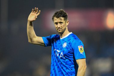 Neill Byrne #5 of Stockport County applauds the fans during the Sky Bet League 2 match Stockport County vs Bradford City at Edgeley Park Stadium, Stockport, United Kingdom, 24th January 202