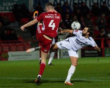 Jack Payne #17 of Boreham Wood and Ethan Hamilton #4 of Accrington Stanley battle for the ball during the Emirates FA Cup Third Round Replay match Accrington Stanley vs Boreham Wood at Wham Stadium, Accrington, United Kingdom, 24th January 202