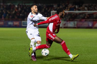 Dennon Lewis #15 of Boreham Wood and Rosaire Longelo #14 of Accrington Stanley battle for the ball during the Emirates FA Cup Third Round Replay match Accrington Stanley vs Boreham Wood at Wham Stadium, Accrington, United Kingdom, 24th January 202