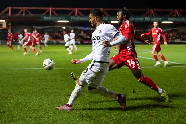 Dennon Lewis #15 of Boreham Wood crosses the ball during the Emirates FA Cup Third Round Replay match Accrington Stanley vs Boreham Wood at Wham Stadium, Accrington, United Kingdom, 24th January 202