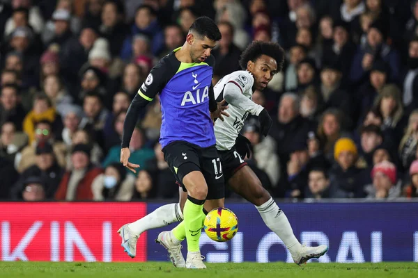 Cristian Romero #17 of Tottenham Hotspur holds off Willian #20 of Fulham during the Premier League match Fulham vs Tottenham Hotspur at Craven Cottage, London, United Kingdom, 23rd January 202