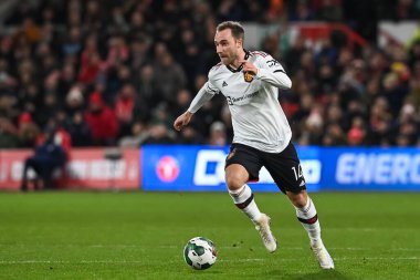 Christian Eriksen #14 of Manchester United makes a break with the ball during the Carabao Cup Semi-Finals match Nottingham Forest vs Manchester United at City Ground, Nottingham, United Kingdom, 25th January 202