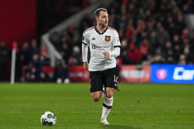 Christian Eriksen #14 of Manchester United makes a break with the ball during the Carabao Cup Semi-Finals match Nottingham Forest vs Manchester United at City Ground, Nottingham, United Kingdom, 25th January 202