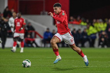 Morgan Gibbs-White #10 of Nottingham Forest breaks with the ball during the Carabao Cup Semi-Finals match Nottingham Forest vs Manchester United at City Ground, Nottingham, United Kingdom, 25th January 202