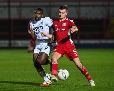 Lee Ndlovu #9 of Boreham Wood battles for the ball with Ryan Astley #5 of Accrington Stanley during the Emirates FA Cup Third Round Replay match Accrington Stanley vs Boreham Wood at Wham Stadium, Accrington, United Kingdom, 24th January 202