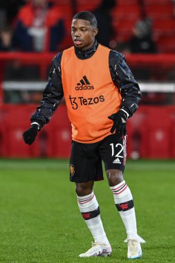 Tyrell Malacia #12 of Manchester United in the pregame warmup session during the Carabao Cup Semi-Finals match Nottingham Forest vs Manchester United at City Ground, Nottingham, United Kingdom, 25th January 202