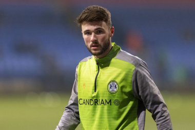 Jamie Robson #12 of Forest Green Rovers warms up before the Sky Bet League 1 match Bolton Wanderers vs Forest Green Rovers at University of Bolton Stadium, Bolton, United Kingdom, 24th January 202