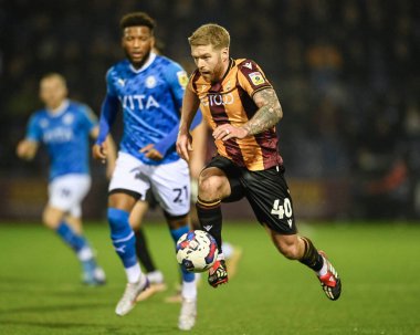 Adam Clayton #40 of Bradford City brings the ball under control during the Sky Bet League 2 match Stockport County vs Bradford City at Edgeley Park Stadium, Stockport, United Kingdom, 24th January 202