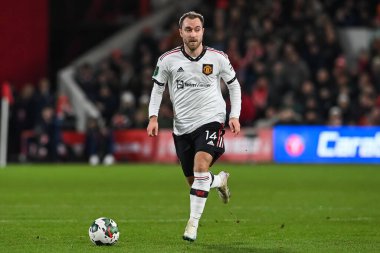 Christian Eriksen #14 of Manchester United makes a break with the ball during the Carabao Cup Semi-Finals match Nottingham Forest vs Manchester United at City Ground, Nottingham, United Kingdom, 25th January 202