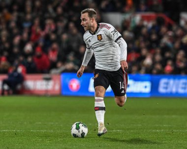 Christian Eriksen #14 of Manchester United breaks with the ball during the Carabao Cup Semi-Finals match Nottingham Forest vs Manchester United at City Ground, Nottingham, United Kingdom, 25th January 202