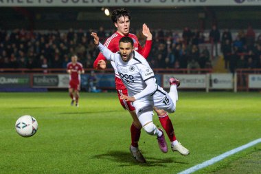 Dennon Lewis #15 of Boreham Wood is fouled by Doug Tharme #34 of Accrington Stanley during the Emirates FA Cup Third Round Replay match Accrington Stanley vs Boreham Wood at Wham Stadium, Accrington, United Kingdom, 24th January 202