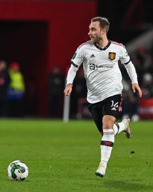 Christian Eriksen #14 of Manchester United makes a break with the ball during the Carabao Cup Semi-Finals match Nottingham Forest vs Manchester United at City Ground, Nottingham, United Kingdom, 25th January 202