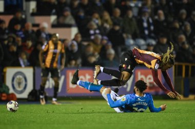 Kyle Wootton #19 of Stockport County fouls Romoney Crichlow-Noble #24 of Bradford City during the Sky Bet League 2 match Stockport County vs Bradford City at Edgeley Park Stadium, Stockport, United Kingdom, 24th January 202