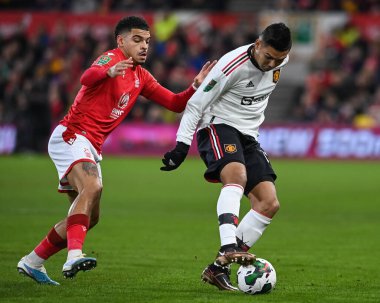 Casemiro #18 of Manchester United holds off Morgan Gibbs-White #10 of Nottingham Forest during the Carabao Cup Semi-Finals match Nottingham Forest vs Manchester United at City Ground, Nottingham, United Kingdom, 25th January 202